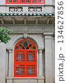 Traditional Asian Architecture with Red Window Frames 134627856