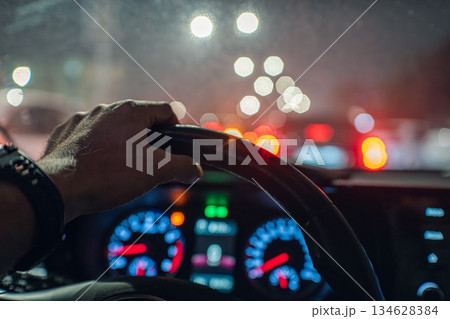 Driving at Night in Traffic 134628384