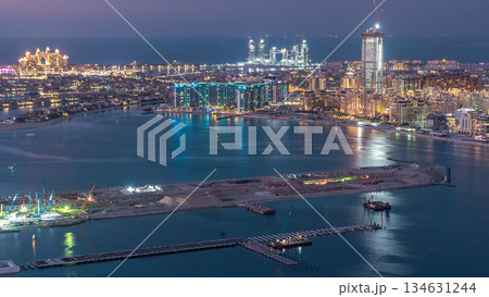 Aerial view of Palm Jumeirah Island day to night timelapse. Aerial view of Palm Jumeirah Island day to night timelapse. 134631244