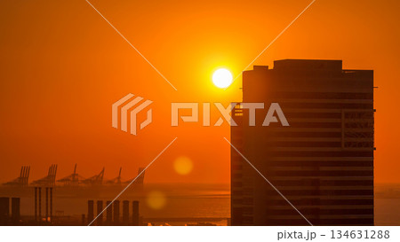 Dubai Marina with colorful sunset in Dubai aerial timelapse, United Arab Emirates Dubai Marina with colorful sunset in Dubai aerial timelapse, United Arab Emirates 134631288