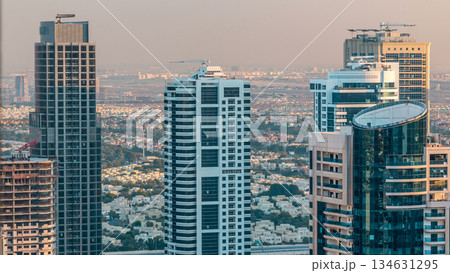 Dubai marina and JLT skyscrapers aerial skyline during sunset timelapse. 134631295