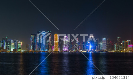 Doha skyscrapers in downtown skyline night timelapse, Qatar, Middle East Doha skyscrapers in downtown skyline night timelapse, Qatar, Middle East 134631314