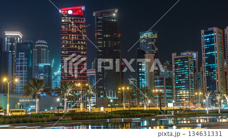 The skyline of Doha by night with starry sky seen from Park timelapse, Qatar 134631331