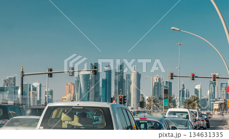 Doha skyline and traffic jam on the intersection timelapse in Doha, Qatar, Middle East. 134631335