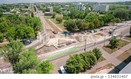 Road construction site with tram tracks repair and maintenance aerial timelapse. 134631407