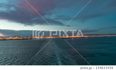 Aerial view of sea with waves and port from ship sailing in the open sea timelapse Aerial view of sea with waves and port from ship sailing in the open sea timelapse 134631439
