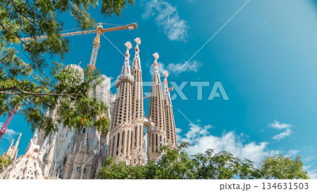 Sagrada Familia, a large Roman Catholic church in Barcelona, Spain timelapse 134631503