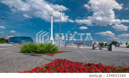 Stele monument Kazakh Eli with bird Samruk and Palace of Independence timelapse hyperlapse. Stele monument Kazakh Eli with bird Samruk and Palace of Independence timelapse hyperlapse. 134631584