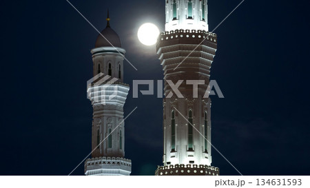 Minarets of The Hazrat Sultan Mosque in Astana timelapse at night with full moon, Kazakhstan 134631593