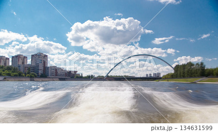 Astana, Kazakhstan. View from Pleasure boat on the river Ishim timelapse hyperlapse drivelapse in Astana. Astana, Kazakhstan. View from Pleasure boat on the river Ishim timelapse hyperlapse drivelapse in Astana. 134631599