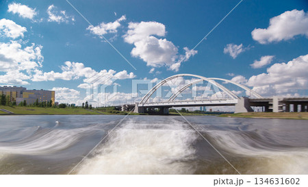 Astana, Kazakhstan. View from Pleasure boat on the river Ishim timelapse hyperlapse drivelapse in Astana. 134631602