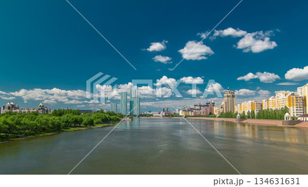 Yesil river timelapse hyperlapse with modern towers of residential complex in Astana 134631631