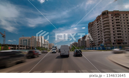 Car drives on street Traffic over the wide boulevards of Astana timelapse hyperlapse drivelapse in Kazakhstan Car drives on street Traffic over the wide boulevards of Astana timelapse hyperlapse drivelapse in Kazakhstan 134631645
