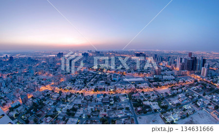 Cityscape of Ajman from rooftop night to day timelapse. Ajman is the capital of the emirate of Ajman in the United Arab Emirates. 134631666