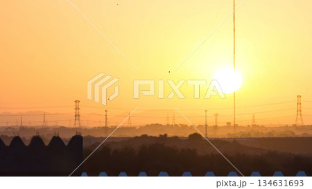 Sunset in Ajman from rooftop timelapse. Ajman is the capital of the emirate of Ajman in the United Arab Emirates. 134631693