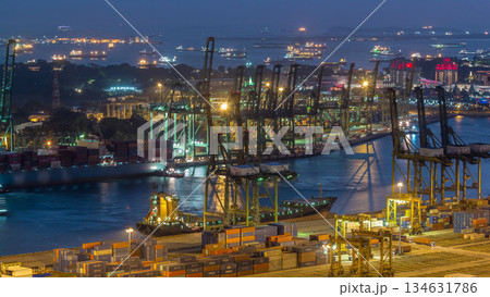 Commercial port of Singapore aerial day to night timelapse. Commercial port of Singapore aerial day to night timelapse. 134631786