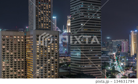 Night panorama with Marina Bay area and skyscrapers city skyline aerial timelapse. 134631794