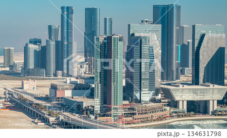 Aerial skyline of Abu Dhabi city centre from above timelapse Aerial skyline of Abu Dhabi city centre from above timelapse 134631798