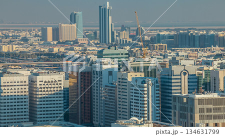 Aerial skyline of Abu Dhabi city centre from above timelapse Aerial skyline of Abu Dhabi city centre from above timelapse 134631799