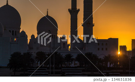 Sheikh Zayed Grand Mosque in Abu Dhabi at sunset timelapse, UAE Sheikh Zayed Grand Mosque in Abu Dhabi at sunset timelapse, UAE 134631836