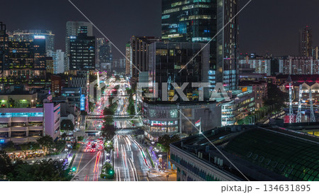 Aerial view of traffic on Eu Tong Sen Street and new bridge road all the way to Chinatown night timelapse 134631895