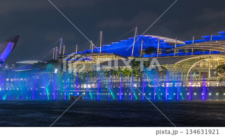 Beautiful laser and musical fountain show at the Marina Bay Sands waterfront in Singapore night timelapse Beautiful laser and musical fountain show at the Marina Bay Sands waterfront in Singapore night timelapse 134631921