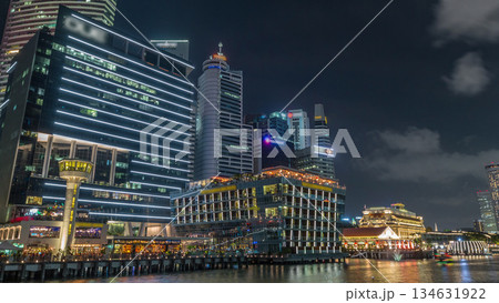 Business Financial Downtown City and Skyscrapers Tower Building at Marina Bay night timelapse hyperlapse, Singapore Business Financial Downtown City and Skyscrapers Tower Building at Marina Bay night timelapse hyperlapse, Singapore 134631922