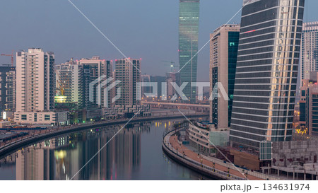 The rhythm of the city of Dubai from night to morning aerial timelapse 134631974