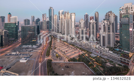 Panorama of Business bay Dubai night to day aerial timelapse. 134632028
