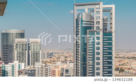 Tecom district skyscrapers aerial view from Greens district timelapse Tecom district skyscrapers aerial view from Greens district timelapse 134632189