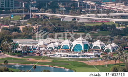 Dubai Marina skyscrapers and golf course morning timelapse, Dubai, United Arab Emirates 134632216