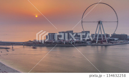 Sunset over Bluewaters Island in Dubai aerial timelapse. 134632258