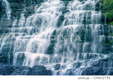 Beautiful waterfall cascade. Tvindefossen. Tvinnevegen, Skulestadmo, Norway 134632730
