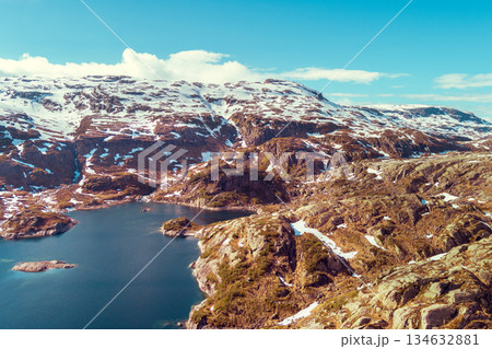 Rocky landscape. View of the mountain lake Svartavatnet in early summer. Sauda Municipality, Norway 134632881