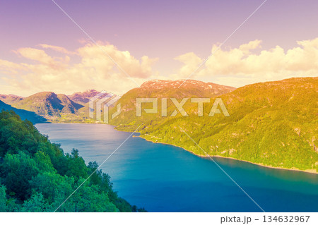 Lake Roldalsvatnet at sunset. Hyttehaugen viewpoint. Beautiful nature Norway Lake Roldalsvatnet at sunset. Hyttehaugen viewpoint. Beautiful nature Norway 134632967