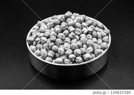 Beautiful organic dried chickpea beans consisting of raw bengal legume pea 134633160