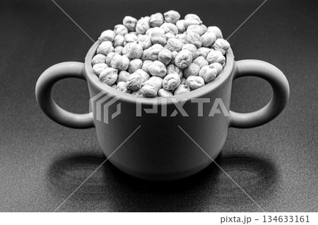Beautiful organic dried chickpea beans consisting of raw bengal legume pea 134633161