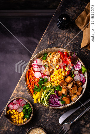 Vegan healthy poke bowl with tofu 134635578