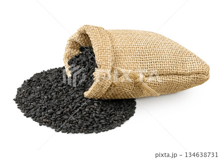 Nigella sativa or Black cumin in a bag isolated on white background 134638731