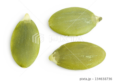 Peeled pumpkin seeds isolated on white background. Top view. Flat lay Peeled pumpkin seeds isolated on white background. Top view. Flat lay 134638736