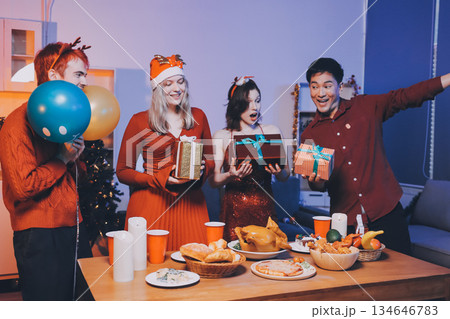 Festive Office Christmas Party with Delicious Food. A beautifully decorated office space with Christmas trees and festive lights, set up for a holiday party. Festive Office Christmas Party with Delicious Food. A beautifully decorated office space with Christmas trees and festive lights, set up for a holiday party. 134646783