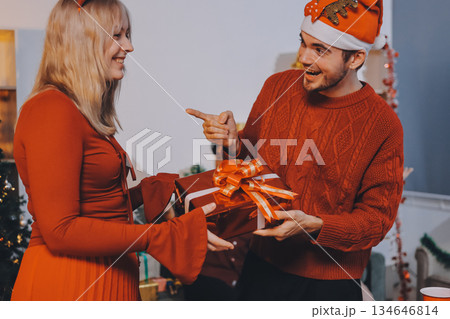Festive Office Christmas Party with Delicious Food. A beautifully decorated office space with Christmas trees and festive lights, set up for a holiday party. Festive Office Christmas Party with Delicious Food. A beautifully decorated office space with Christmas trees and festive lights, set up for a holiday party. 134646814