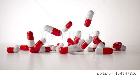 白背景に舞う赤白カプセルの医療コンセプト背景 134647816