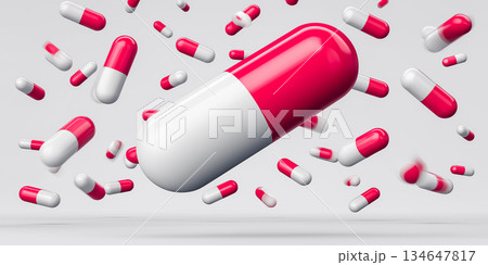 白背景に舞う赤白カプセルの医療コンセプト背景 134647817