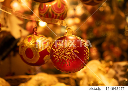 Beautiful Christmas baubles with traditional ornaments, cozy and warm Christmas card 134648475