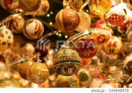 Beautiful Christmas baubles with traditional ornaments, cozy and warm Christmas card Beautiful Christmas baubles with traditional ornaments, cozy and warm Christmas card 134648478