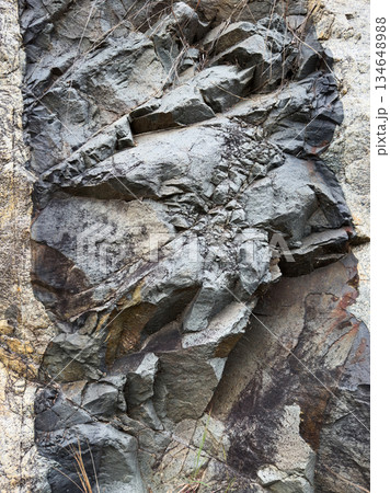 Layered rock formation showing textures and colors in nature 134648988
