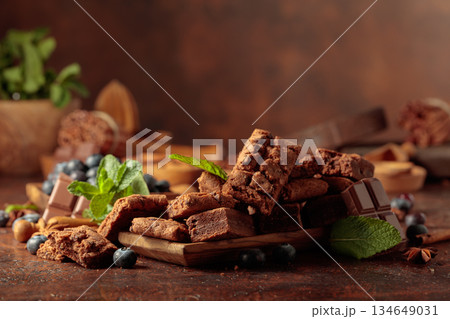 Brownie with blueberries and mint. 134649031