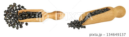 Black bean or Urad dal, black gram, vigna mungo in wooden scoop isolated on the white background. Top view. Flat lay. 134649137