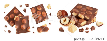 Chocolate with hazelnuts isolated on white background with full depth of field. Top view. Flat lay Chocolate with hazelnuts isolated on white background with full depth of field. Top view. Flat lay 134649211
